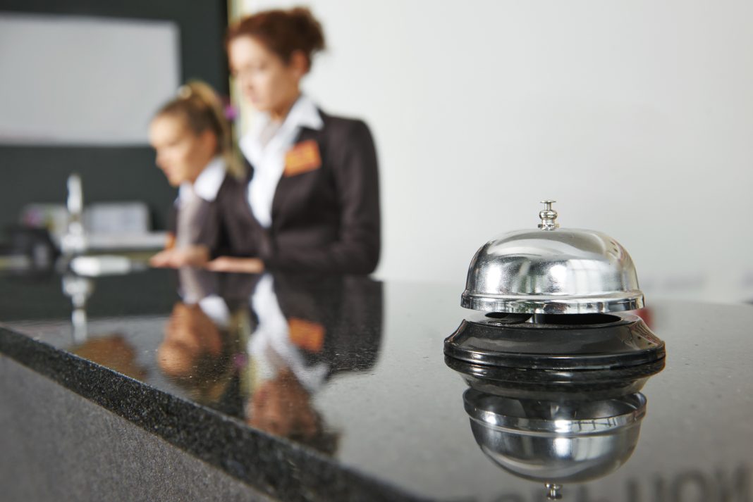 Hotel Front Desk with Bell
